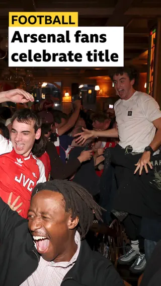 Arsenal fans celebrate