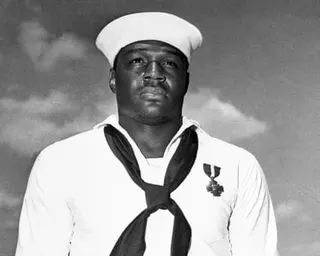 a sailor looks ahead