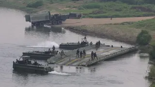 US troops conduct a river-crossing drill on the Imjin River in Paju, South Korea