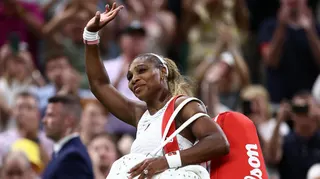Serena Williams waves to the Wimbledon crowd