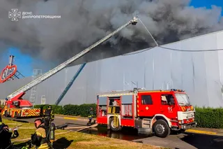 In this photo provided by the Ukrainian Emergency Service, firefighters work on a fire at a shopping mall following a Russian drone attack in Kryvyi Rih, Ukraine, Friday, Aug. 21, 2026. (Ukrainian Emergency Service via AP)