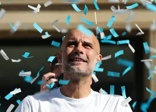 Manchester City manager Pep Guardiola during a May 25 victory parade in Britain’s northern city of Manchester for their successes in the FA Cup and Carabao Cup.