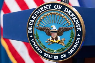 The Department of Defense seal is seen on the podium in the Press Briefing room at the Pentagon, Oct. 29, 2024, in Washington. (AP Photo/Kevin Wolf, File)