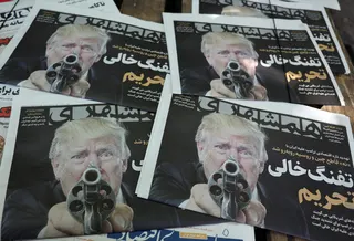 Copies of an Iranian newspaper displaying a picture of US President Donald Trump outside a kiosk in Tehran on Saturday. Photo: EPA