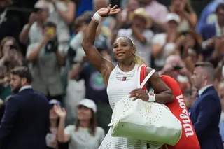 Serena Williams of the United States greets the audience as she leaves after losing to Maya Joint of Australia in their first round women's singles match at the Wimbledon Tennis Championships in London, Tuesday, June 30, 2026. (AP Photo/Maja Smiejkowska)