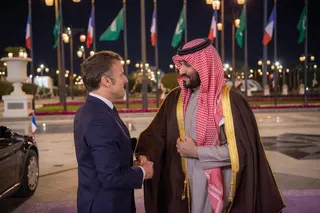 In this photo provided by the Saudi Royal Palace, French President Emmanuel Macron is welcomed by Saudi's Crown Prince Mohammed bin Salman, right, at the Royal Palace in Riyadh, Saudi Arabia, Monday, Dec. 2, 2024. (Bandar Aljaloud/Saudi Royal Palace via AP)