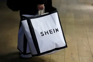 A customer holds a Shein shopping bag. Photo: Reuters