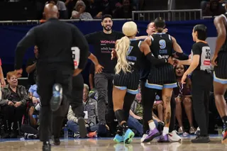 CHICAGO, ILLINOIS - AUGUST 23: Former basketball player Enes Kanter Freedom and Natasha Cloud #9 of the Chicago Sky yell at one another during the second half between the Chicago Sky and the Indiana Fever at Wintrust Arena on August 23, 2026 in Chicago, Illinois. NOTE TO USER: User expressly acknowledges and agrees that, by downloading and or using this photograph, User is consenting to the terms and conditions of the Getty Images License Agreement. Michael Reaves/Getty Images/AFP (Photo by Mich