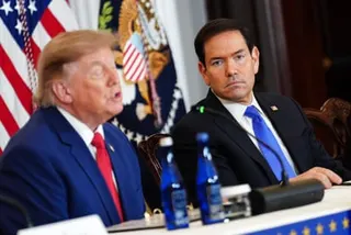 Trump and Marco Rubio speaking at a panel