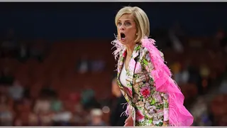 Kim Mulkey reacts on court