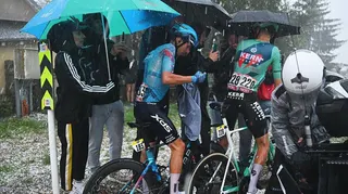 Lorenzo Fortunato of Italy and Team XDS Astana and Mats Wenzel of Luxembourg and Team Equipo Kern Pharma react after the cancellation of the stage due to a hailstorm during the La Vuelta - 81st Tour of Spain 2026, Stage 3 a 174km from Gruissan - Aude to Font Romeu