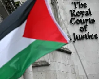 A Palestinian flag flown outside the Royal Courts of Justice