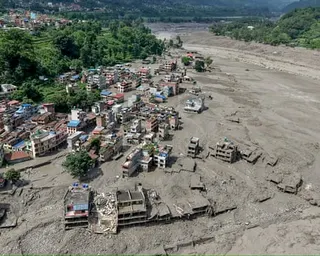 Aerial view of Trishuli Bazar, Nepal, buildings buried in mud after flash floods