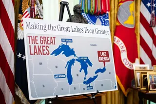 A poster showing the name change from Lake Ontario to Lake America, in the Oval Office of the White House on Aug 27.