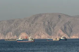 This file picture shows vessels anchored in the Strait of Hormuz, off the port city of Khasab on Oman northern Musandam Peninsula. — AFP pic