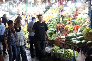 Iranians shopping at a bazaar in northern Tehran, Iran, on Aug 25. Food inflation reportedly hit 128 per cent year-on-year in July in Iran.