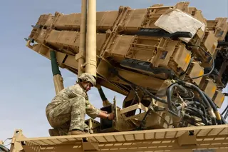 A US Army air defence artilleryman conducts maintenance on an MIM-104 Patriot missile system at an undisclosed location in the Middle East, in an image released in June. Photo: US Army via AFP
