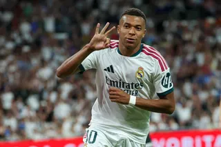 Real Madrid’s Kylian Mbappe celebrates after scoring a hat-trick in the 4-1 victory over Real Sociedad. — AFP pic
