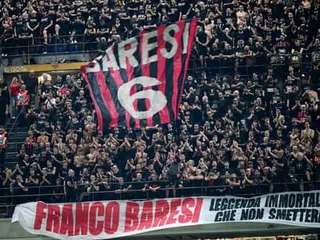 Milan supporters display a huge Baresi banner at San Siro before kick-off in the game against Venezia