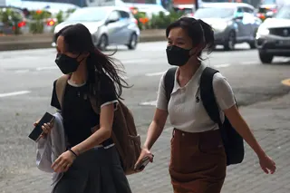 Women wear face masks during haze in Kuala Lumpur, Malaysia, in August. The city briefly had the world’s most polluted air late on Thursday. Photo: EPA