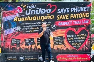 A speaker at The “Save Phuket” event at Patong Beach, Phuket on Aug 28.