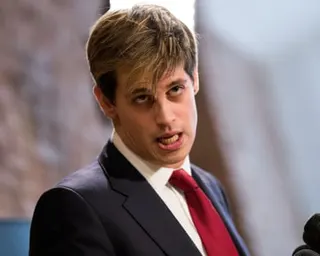 Man in suit with red tie
