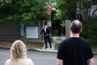 An auctioneer calls for bids during a property auction in Bondi, Sydney, on June 13. Photo: Reuters