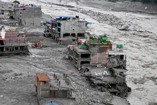 Poor weather and high volume of SOS calls hamper search for group uncontactable after flash floods. AFP
