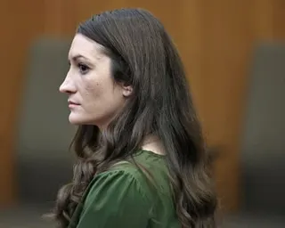 Woman in green shirt