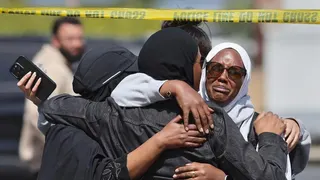 Members of the Muslim community in San Diego react after shooting at their mosque on 18 May 2026