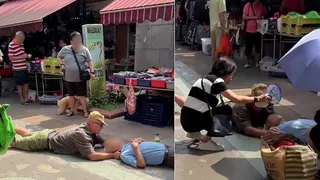 实龙岗老翁倒地疑失意识 男子趴地护颈获赞专业