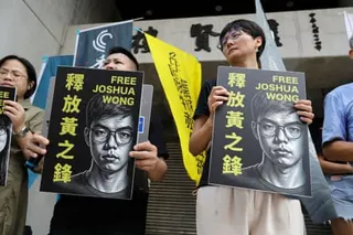 Hong Kong activist and supporters hold signs during a press event to support pro-democracy activist Joshua Wong in Taipei, Taiwan, Wednesday, 2 Sept., 2026.