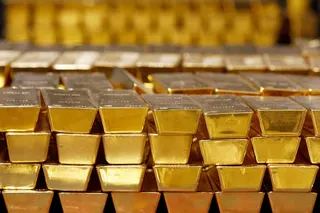 Gold bars are stacked in a vault at the United States Mint in West Point, New York, in July 2014. Photo: AP