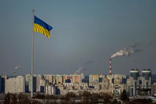 The Ukrainian national flag flies over the city, amid Russia’s attack on Ukraine, in central Kyiv, Ukraine, February 17, 2025. REUTERS/Thomas Peter