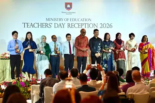 The award recipients with President Tharman Shanmugaratnam (centre) at the annual Teachers’ Day Reception on Sept 3. Joining them are Minister for Education Desmond Lee (fifth from left) and Second Minister for Education David Neo (fifth from right).