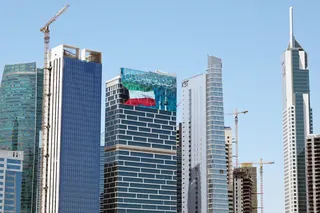 A large screen displays a verse from the Quran reading ‘My Lord, make this city secure,’ alongside the Kuwaiti flag and the landmark Kuwait Towers, on a skyscraper in Kuwait City on September 2, 2026. Iran launched a wave of attacks on US sites across the Middle East on September 2, as violence surged after an extensive American bombardment and the deaths of four people at an Iranian wedding party. — AFP pic