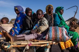 Sudanese refugees ride through the Oure Cassoni refugee camp, Chad, on February 24, 2026 [Dan Kitwood/Getty Images]