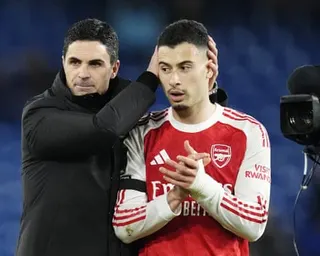 Mikel Arteta pictured with Gabriel Martinelli