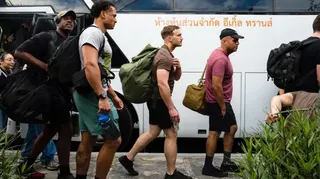 Three young US military men arrive at Hard Rock Hotel Pattaya for a welcoming ceremony