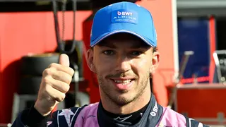 Pierre Gasly gives a thumbs-up at the camera after taking pole position for the Italian Grand Prix