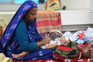 A child receives treatment for measles in Dhaka on Thursday. Bangladesh’s deadliest measles outbreak in decades is nearing the grim milestone of 1,000 child deaths. Photo: AFP