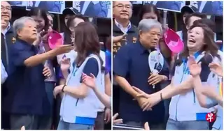 前新竹县长范振宗星期四现身国民党新竹县参选登记活动时，一度作势掌掴国民党主席郑丽文，郑丽文随即抬手挡开。 （自由时报）