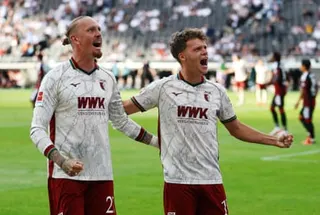 Augsburg's Robin Fellhauer (right) celebrates his goal against Eintracht Frankfurt with team-mate Marius Wolf.