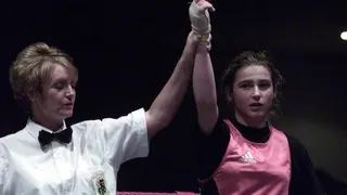 Katie Taylor with hand raised in 2001