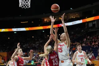 China’s Han Xu rebounds over Czechia’s Petra Holesinska during her team's thrilling Women’s Basketball World Cup win in Berlin on Sunday. Photo: AP