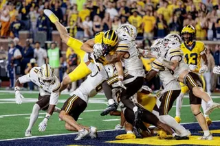 Michigan wide receiver JJ Buchanan makes the game-winning catch for a last-second touchdown against Western Michigan on Saturday in Ann Arbor.